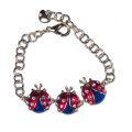 Red and Blue Enamel and Diamond-like Swarovski Crystals.